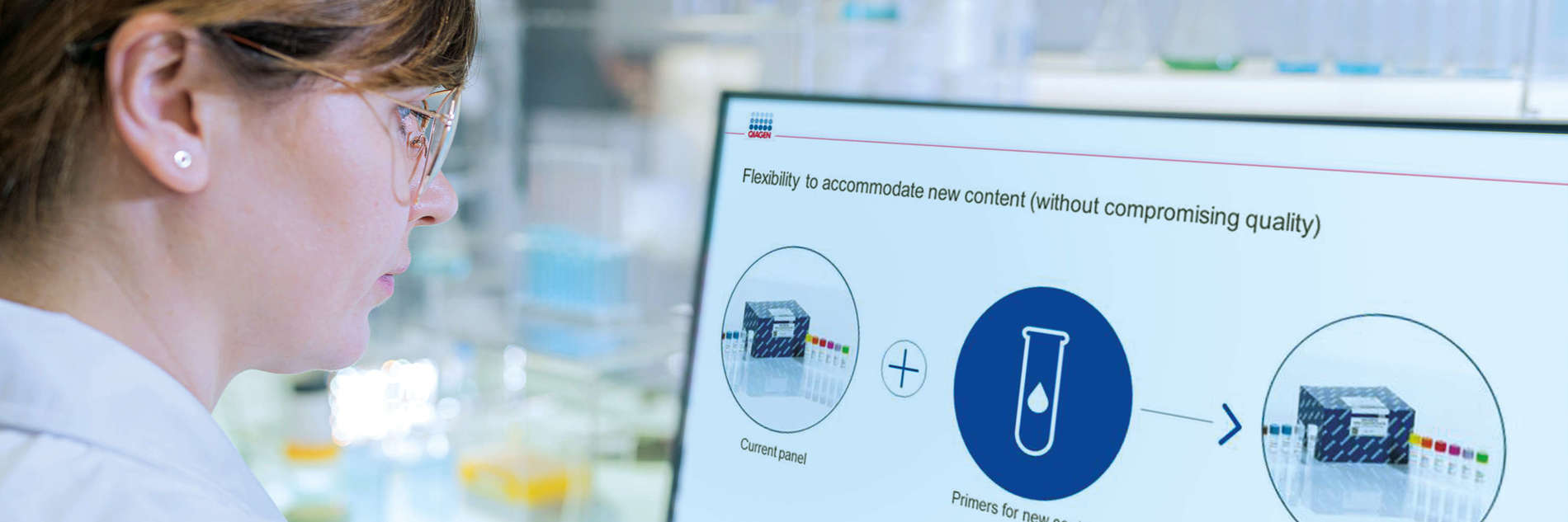 Female scientist working on a computer in a laboratory, presentation on screen, clinical genomics, QIAseq Targeted DNA panels